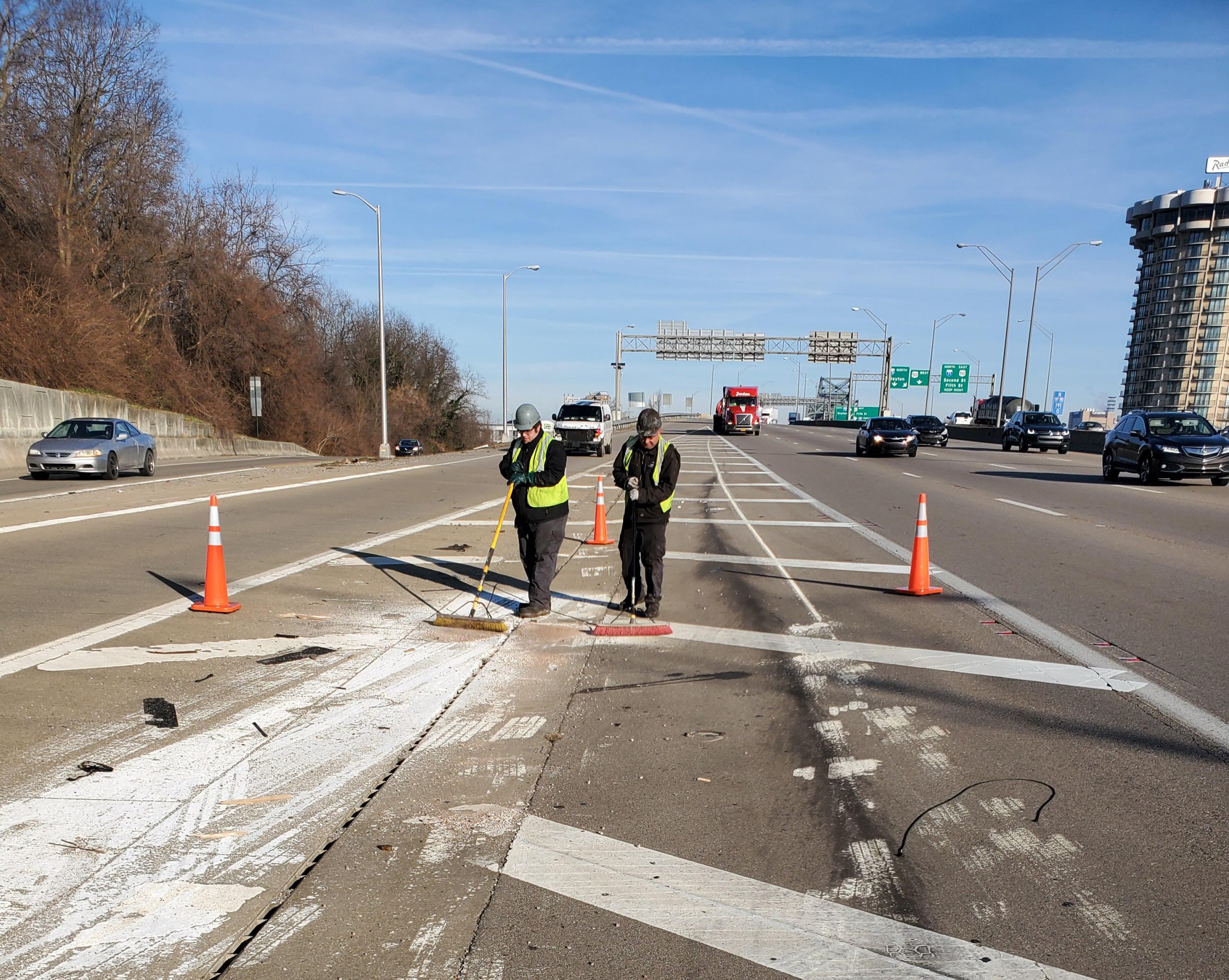 crew cleaning road